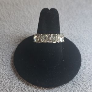 Silver ring with round crystals